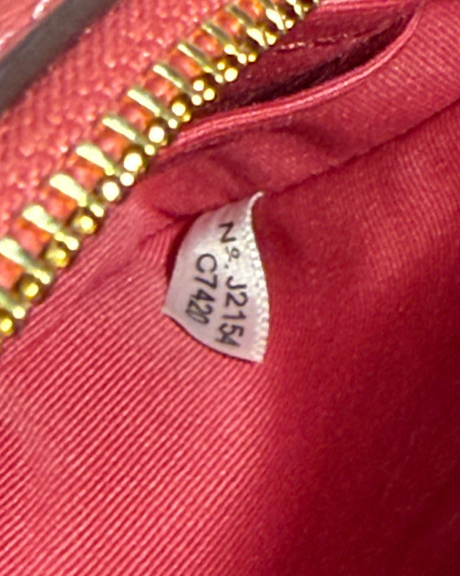 Coach Corner Zip Wristlet – Strawberry Haze Embossed Leather (C7420)